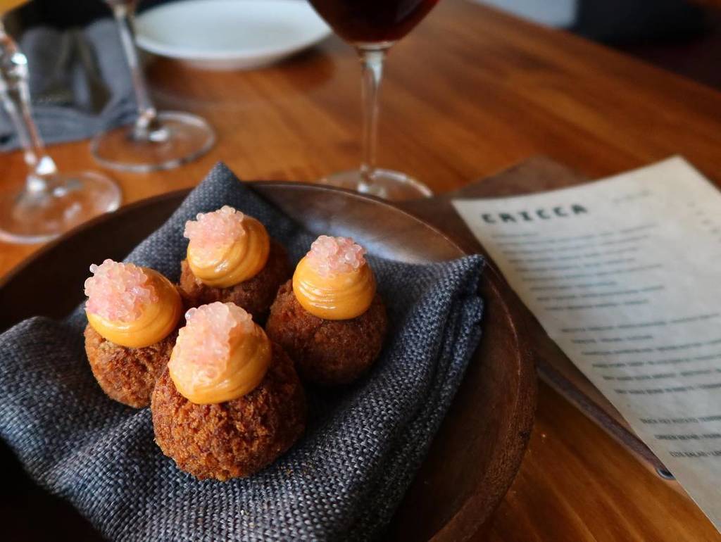 Arancini and cocktails at Cricca restaurant in Windsor NSW, a historic riverside town
