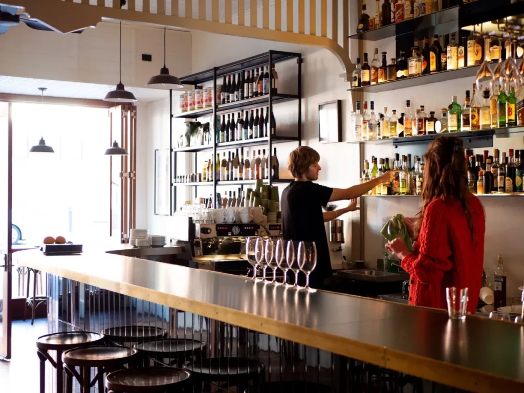 Interior of Stonefruit wine bar and cafe in Tenterfield with wine bottles lining the bar