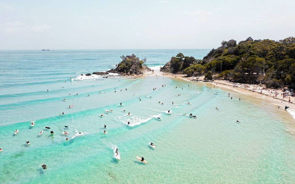 people surfing at byron bay