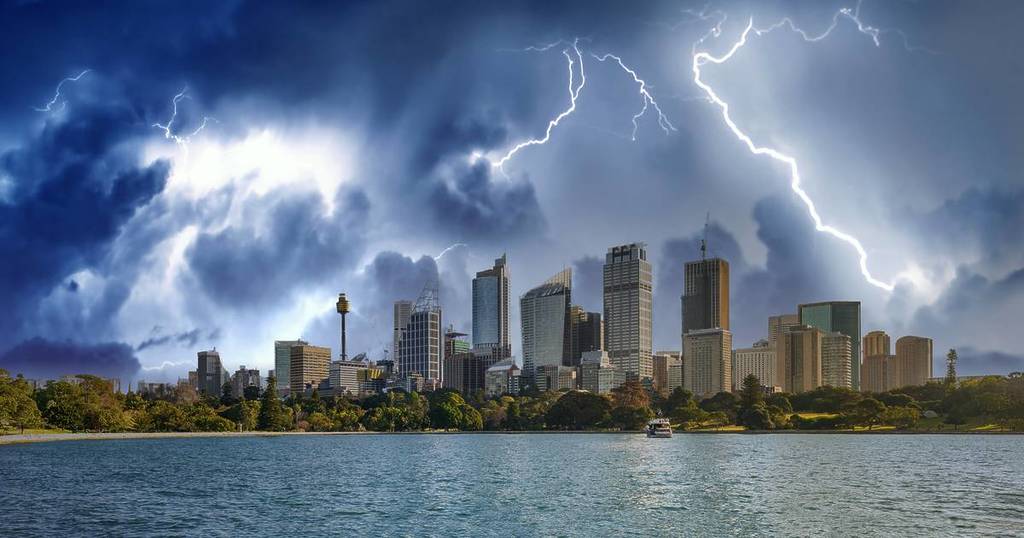 Storm clouds and lightning over the Sydney skyline as severe weather moves across the city