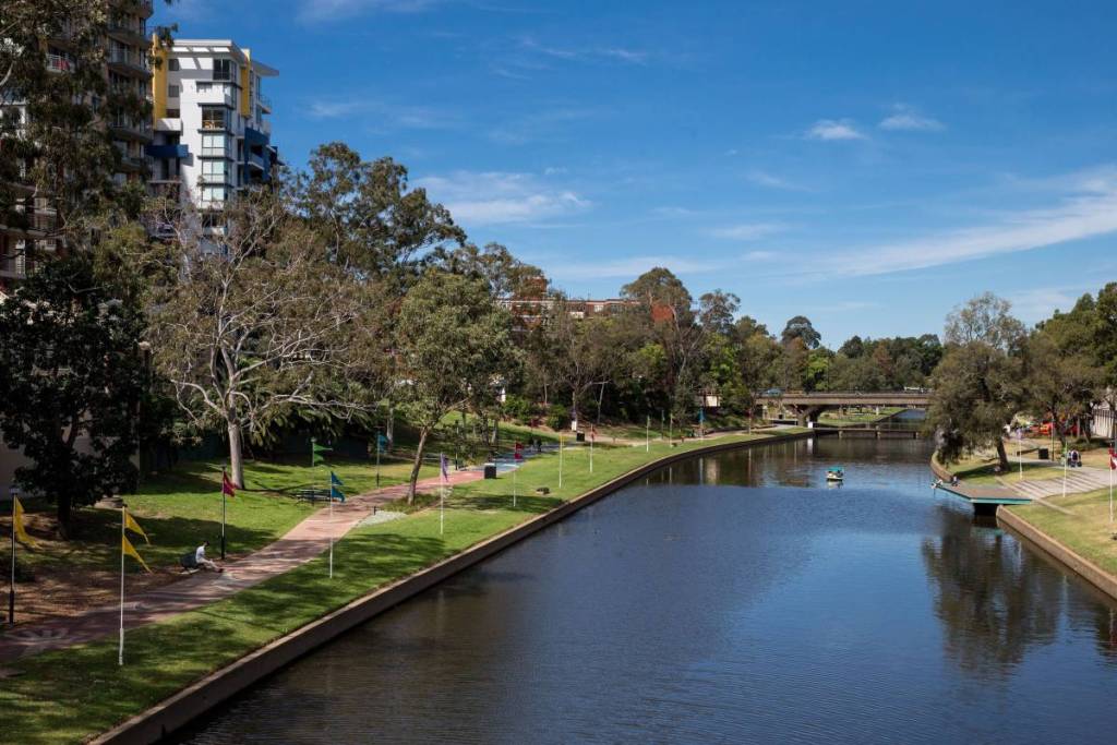 View of the Parramatta River foreshore and riverside walking paths near Queens Wharf Reserve in Parramatta