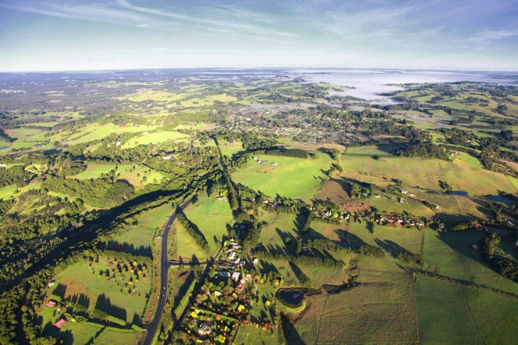 Aerial view of Robertson surrounded by the rolling green hills of the Southern Highlands