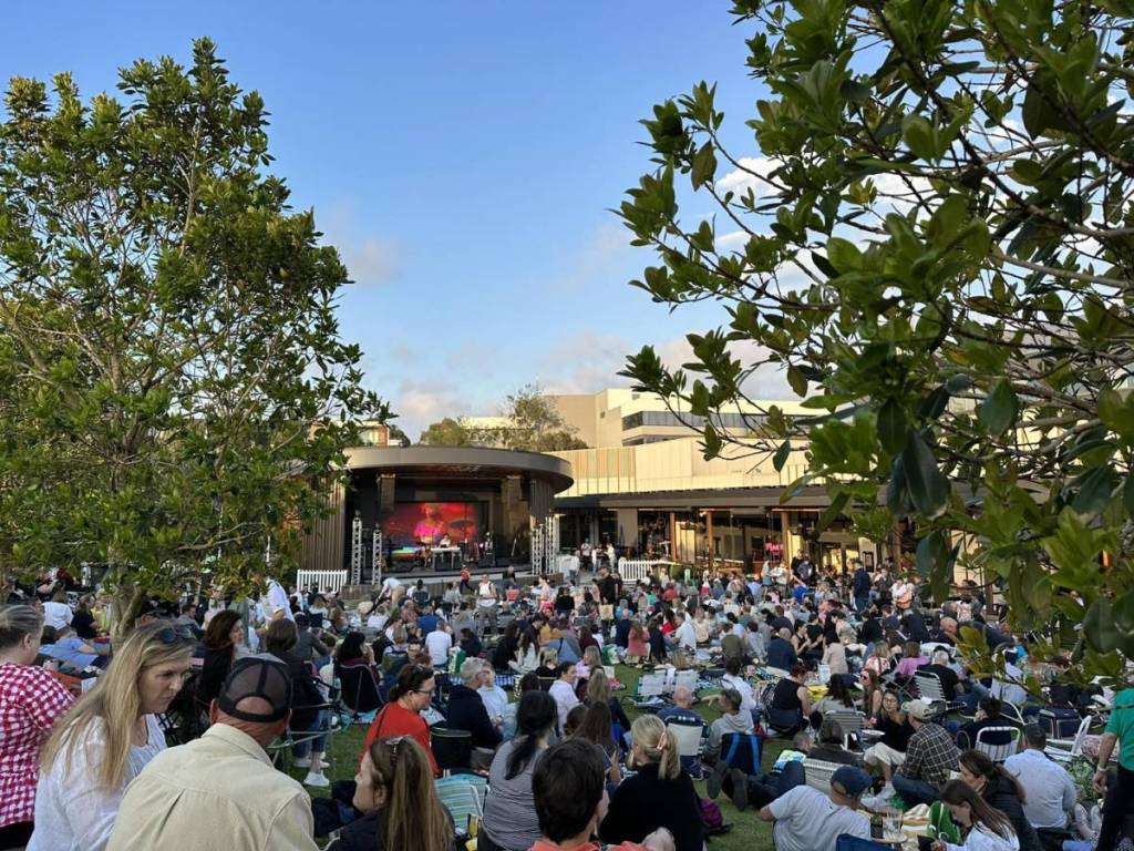 Crowds enjoying an outdoor performance at The Canopy during Lane Cove Festival
