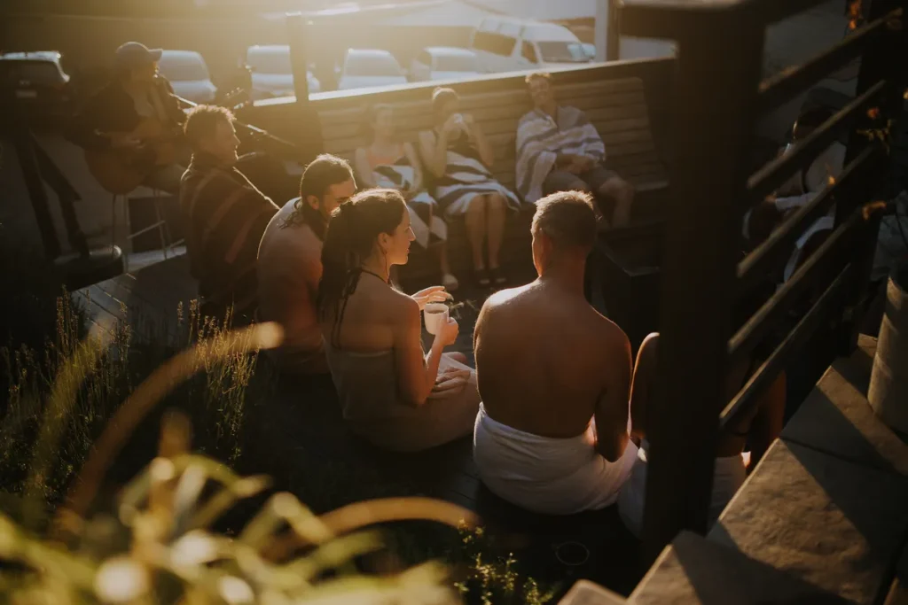 Visitors gathering outdoors with live music at Blue Mountains Sauna in Leura during The Big Sweat festival