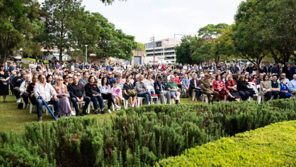 people gathered at in Sydney for memorial at park