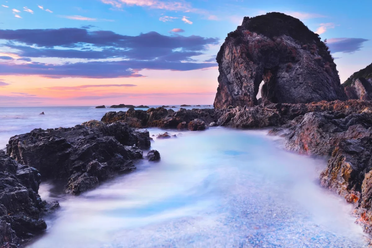 Horse Head Rock rising from the ocean near Bermagui on the NSW South Coast
