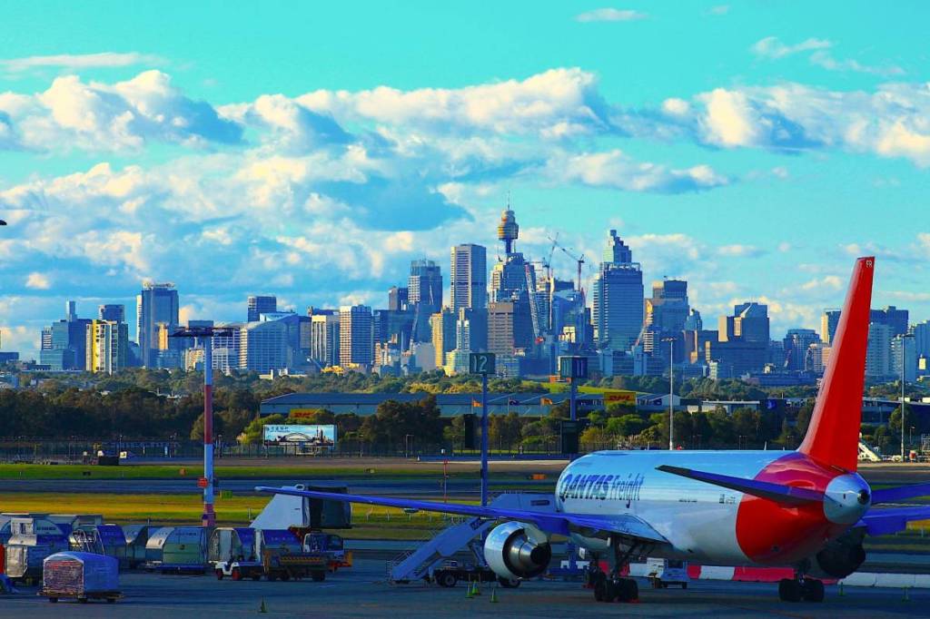 Sydney skyline visible from the airport