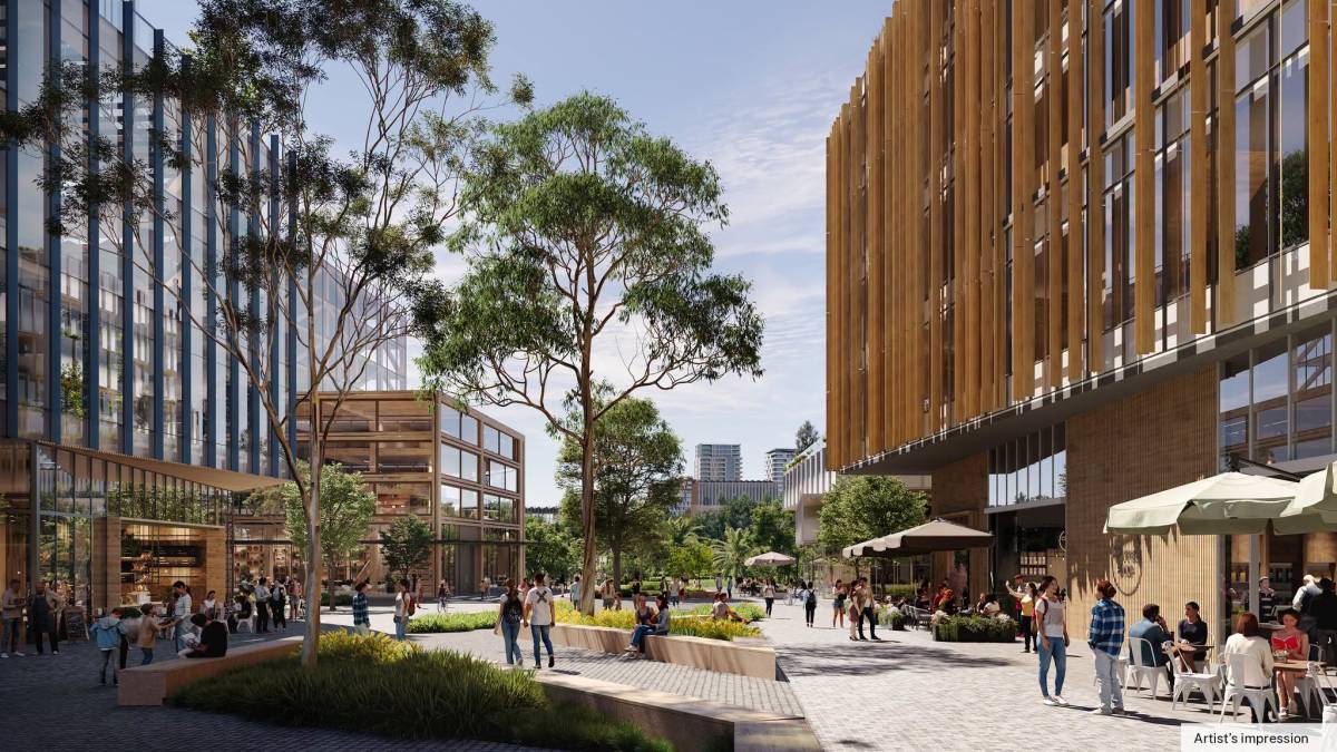 Artist’s impression of a tree-lined public plaza with new buildings, outdoor dining and pedestrian spaces in Parramatta North