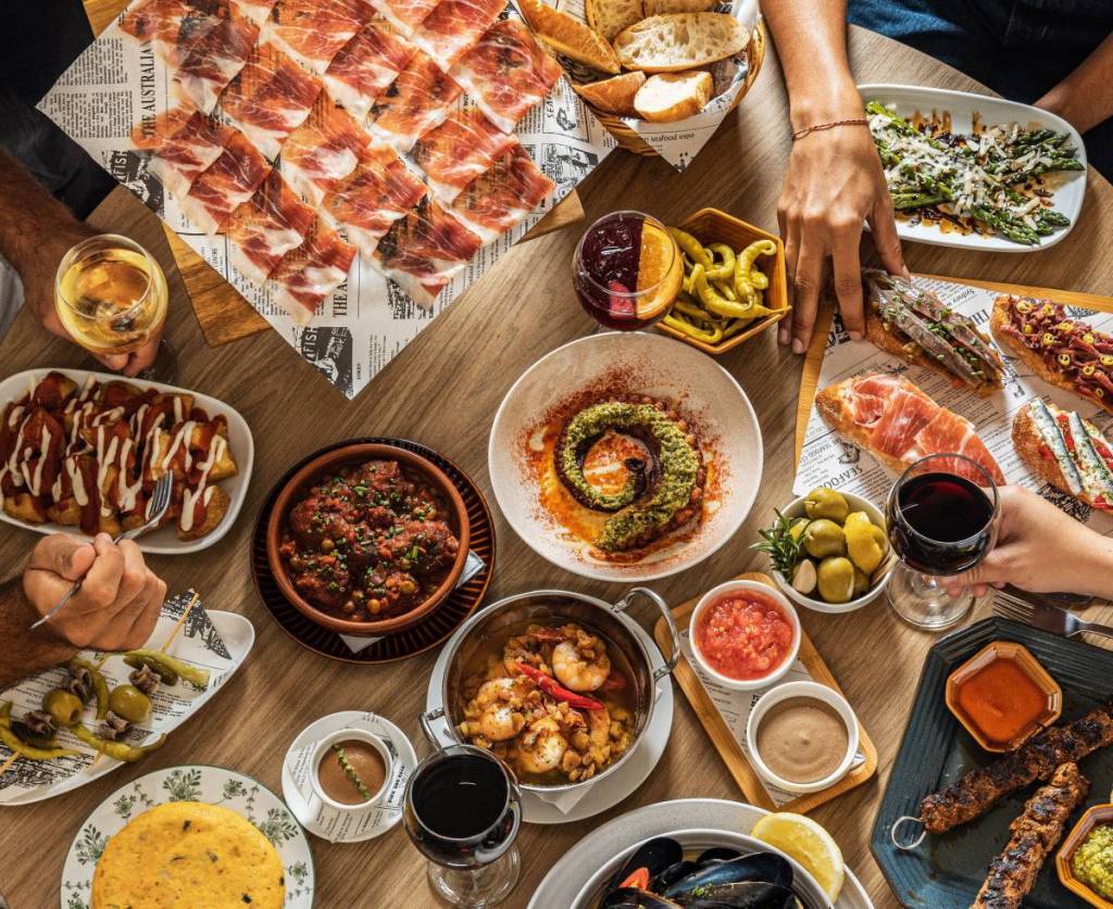 a table full of Spanish tapas 