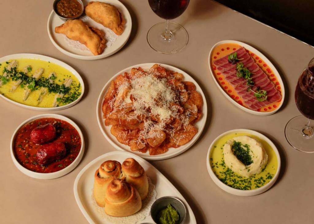a spread of spanish food on a table at Caness, Sydney