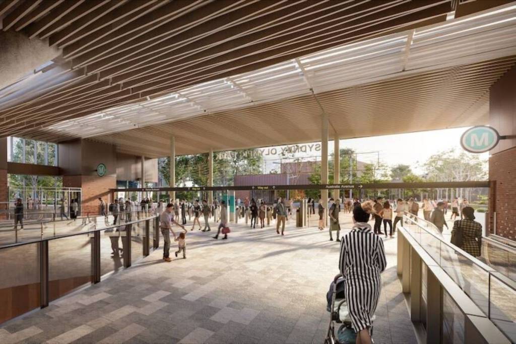 people at sydney olympic park metro station's entrance