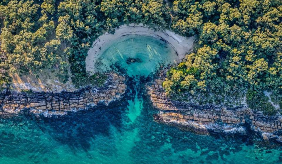 This quiet coastal village in NSW is a smarter spring alternative to Byron Bay — with stunning beaches, rugged headlands and a natural rock tunnel