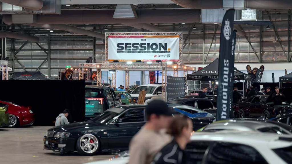 Session 2026 with cars and Sung Kang
