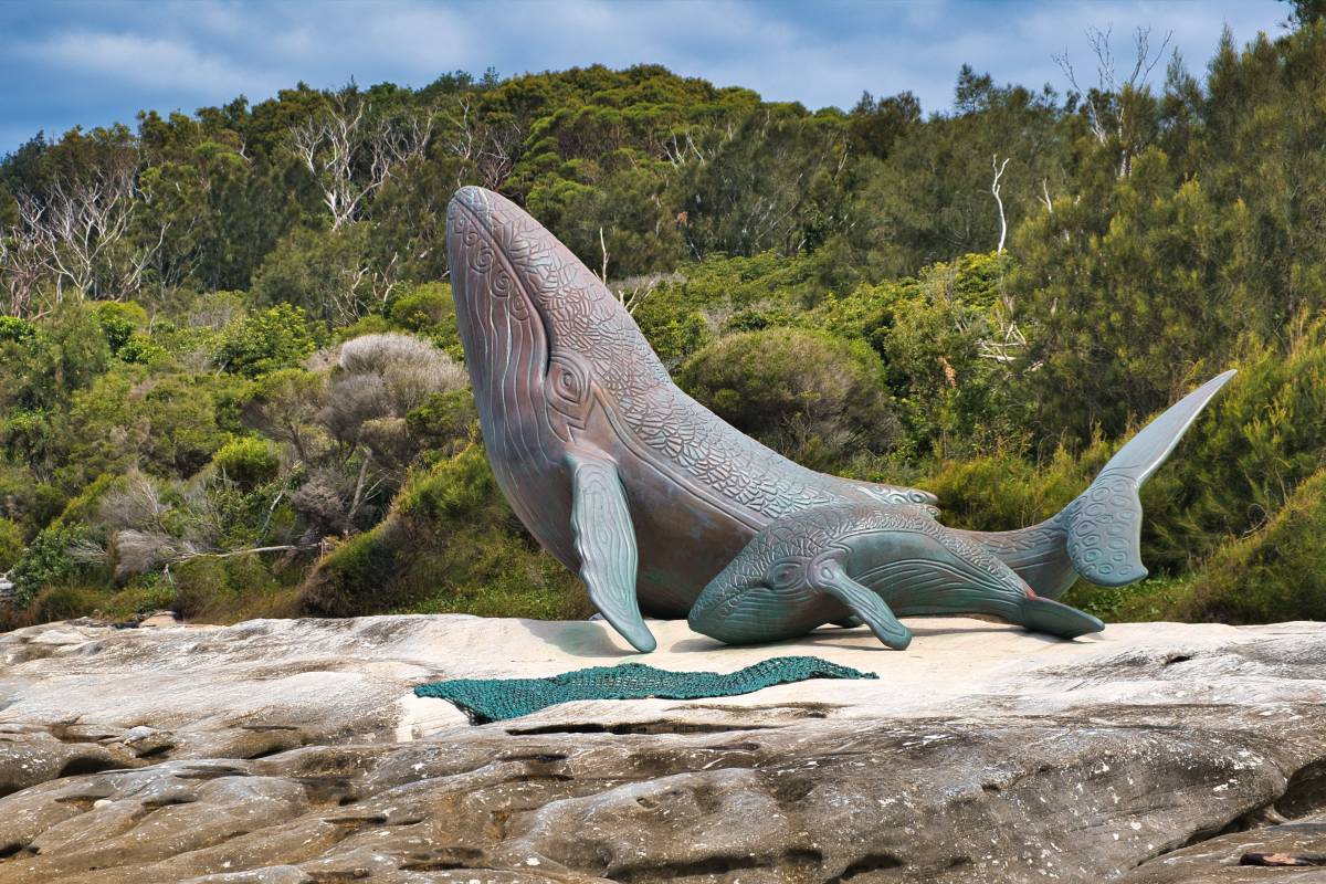 Whale sculptures surrounded by native bushland in Kamay Botany Bay National Park