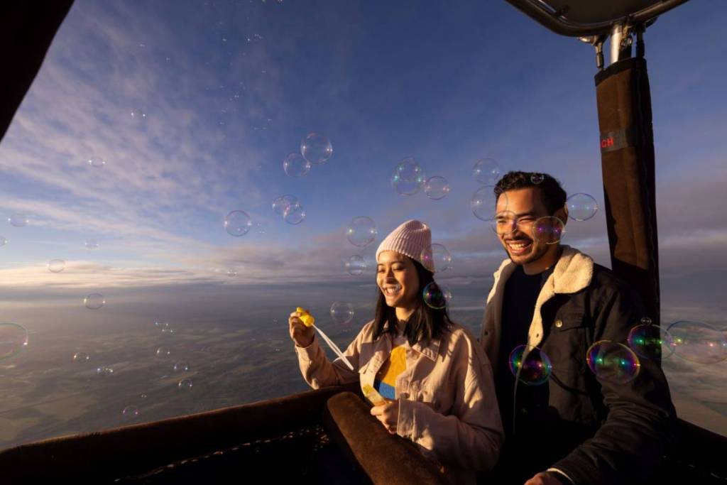 people blowing bubbles above hunter valley balloon fiesta 2026 this long weekend in October