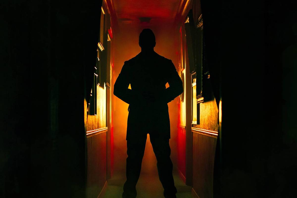 silhouette in dark hallway