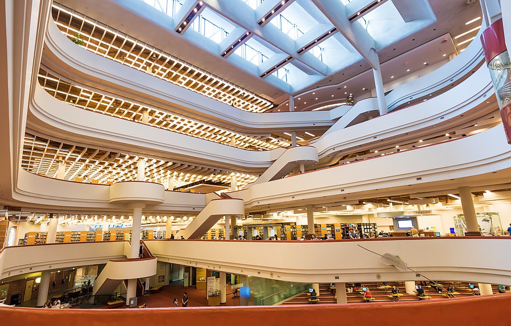 modern building with lots of floors and sunlit atrium