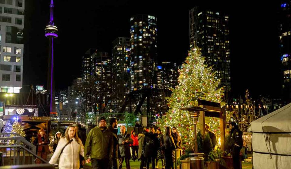 A Beloved Holiday Festival Returns To Toronto With A 120-Foot Light Tunnel, Outdoor Curling, And A Speakeasy Martini Bar