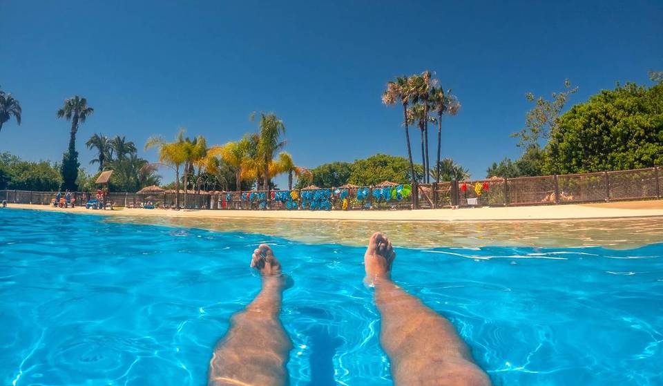 The closest thing to a beach in Seville: the new pool with real sand, lounge chairs, and a beach bar is now open