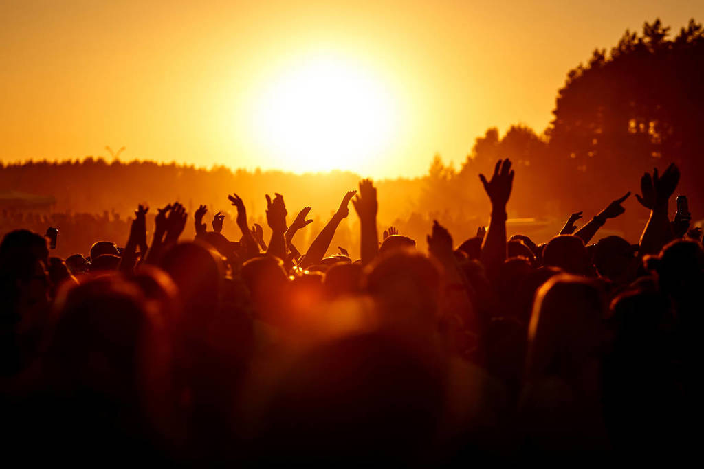 Revelers at sunset