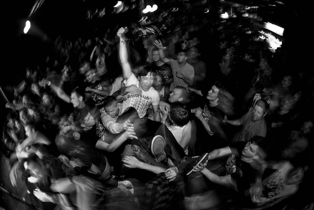 crowd surfer, punk rock escalation