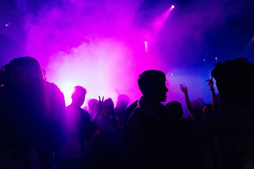 people celebrating at a concert