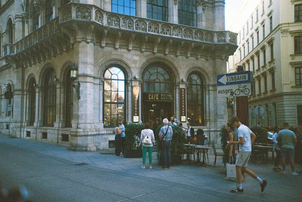 People in front of Café Central