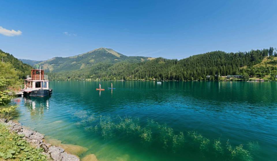 A Caribbean vibe in the mountains—take the train and a historic steam tram to this crystal-clear mountain lake at 827 meters