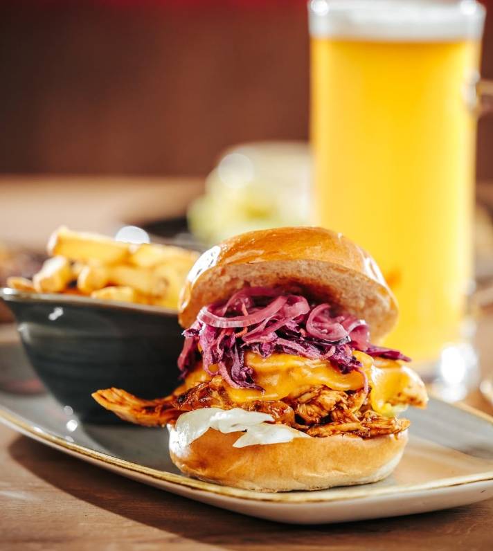 At Freiherz in Vienna, you can enjoy not only the classic pork knuckle but also the pork knuckle burger