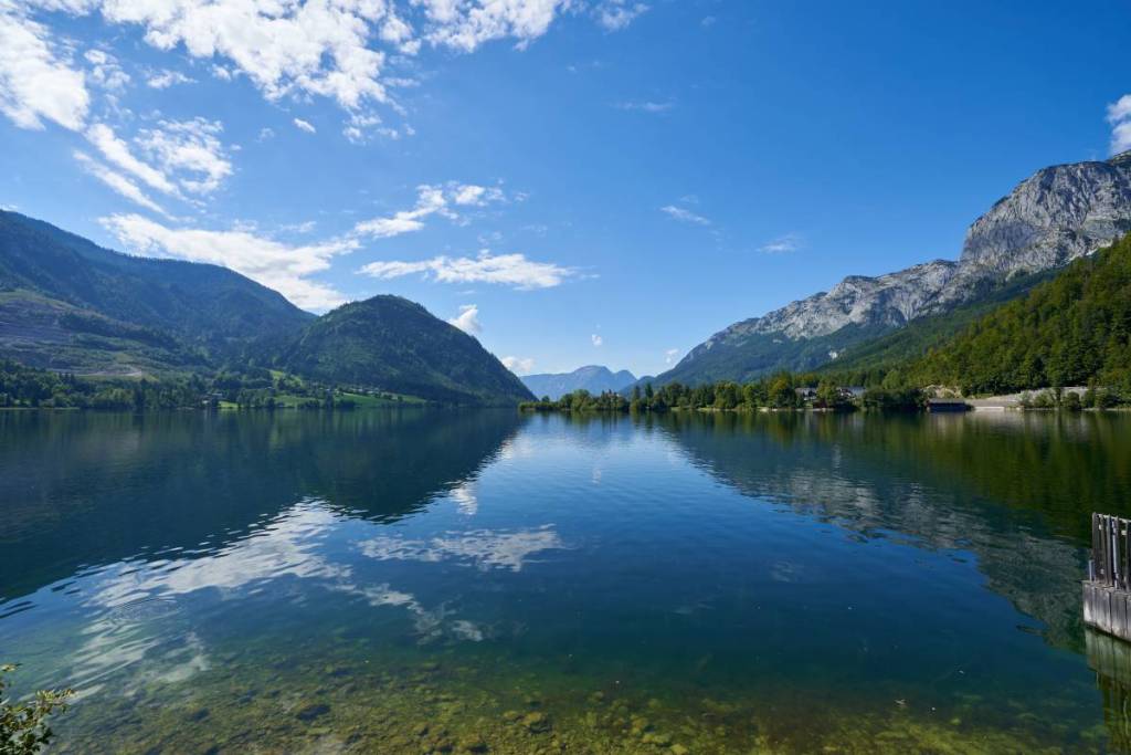 Just 2.5 hours from Vienna, this hidden gem—Styria’s warmest natural swimming lake—awaits you with water at 27 degrees, including therapeutic moor water and a free floating sauna.